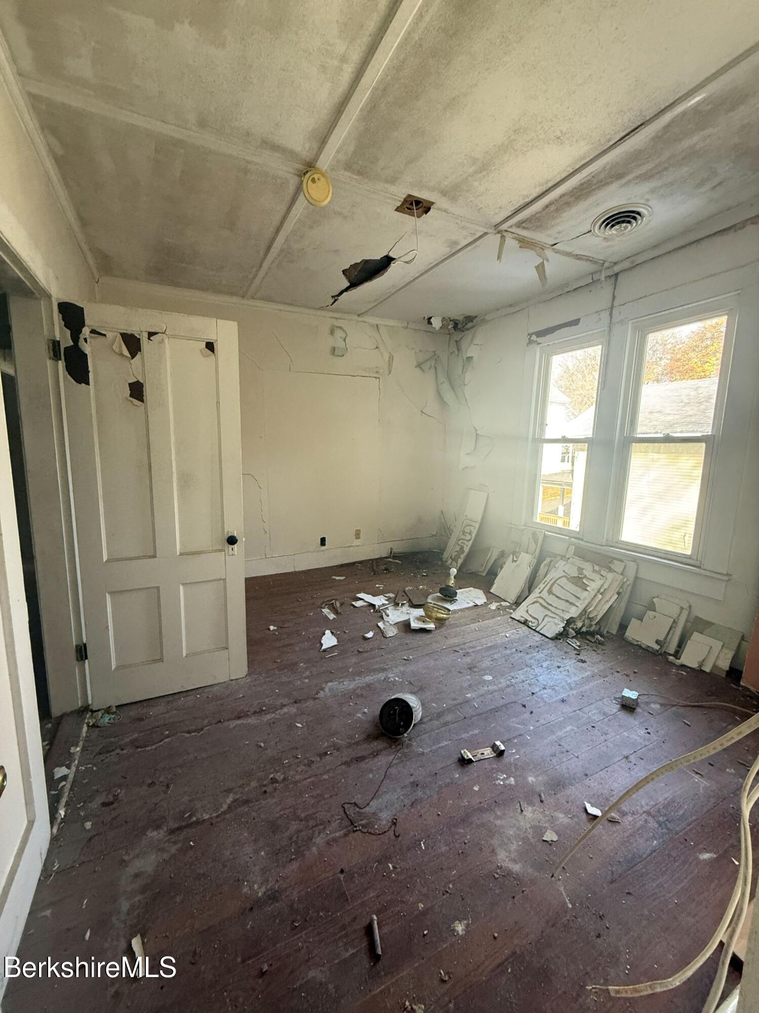 32-38 Spring Street North Adams, MA 01247 - Photo 17 of 32 a view of a livingroom with a hardwood