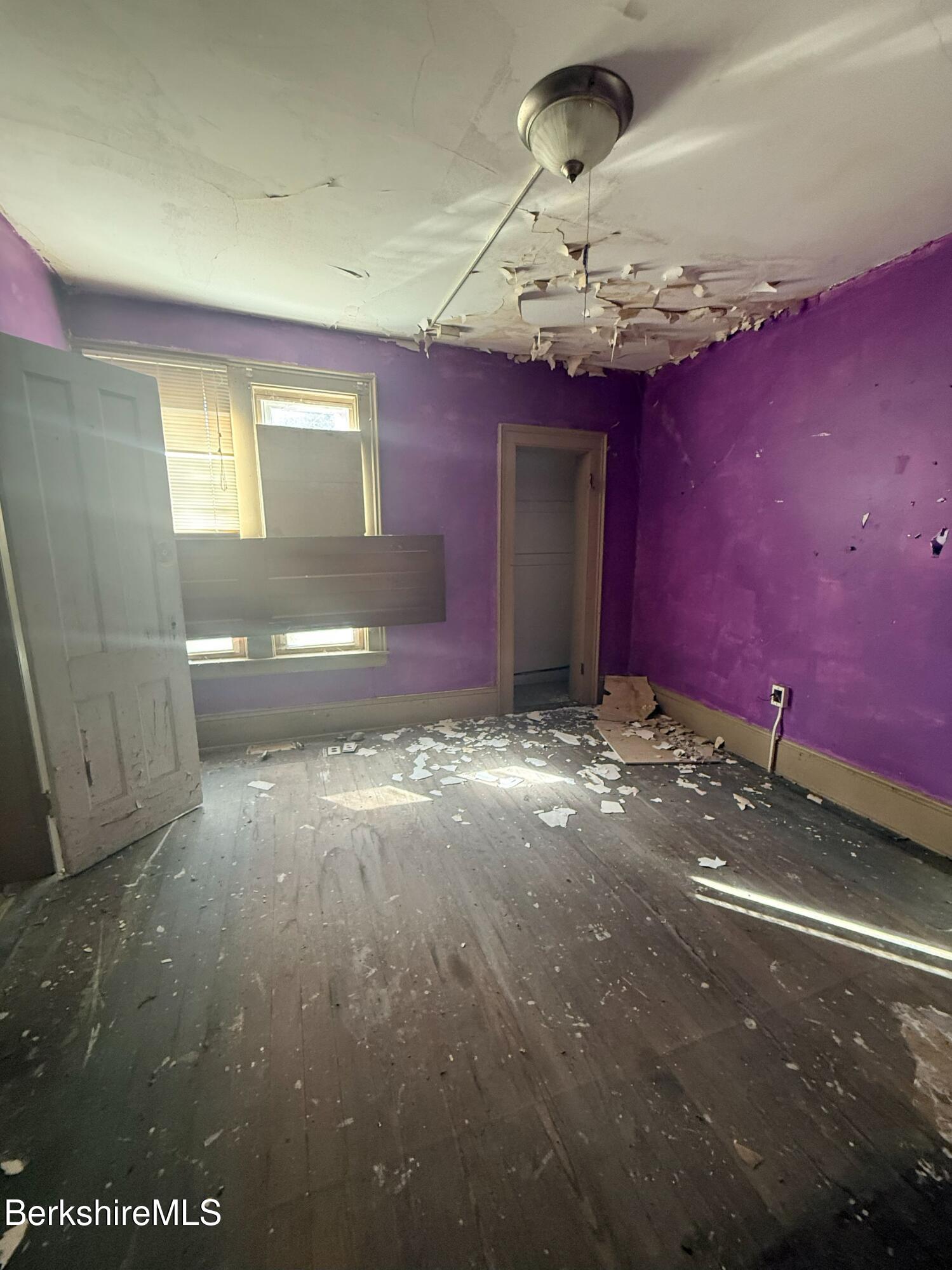 32-38 Spring Street North Adams, MA 01247 - Photo 25 of 32 a view of a livingroom with a hall