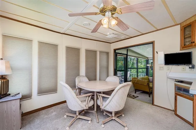 a view of a livingroom with furniture and a fireplace