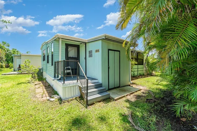 a view of a house with a swimming pool