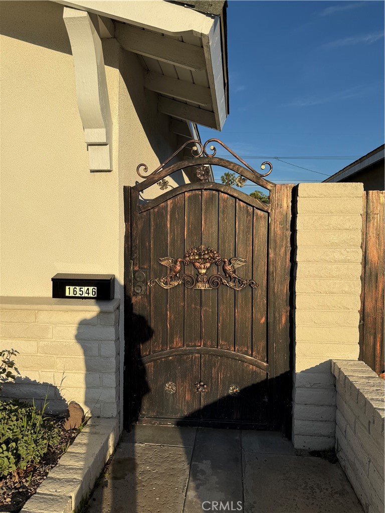 a view of a balcony with furniture