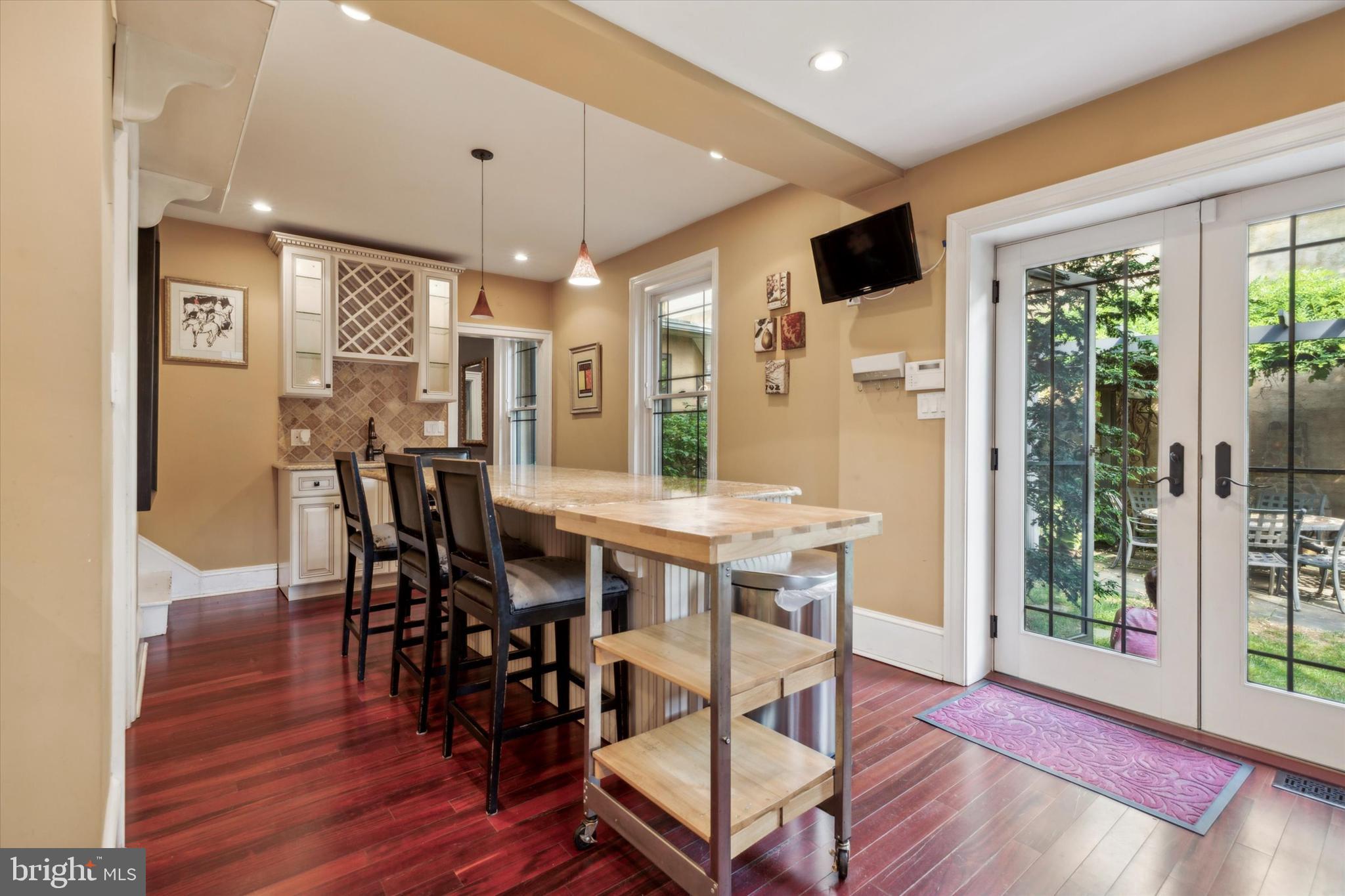 6113 Ridge Avenue Philadelphia, PA 19128 - Photo 8 of 25 a view of a dining room with furniture window and wooden floor