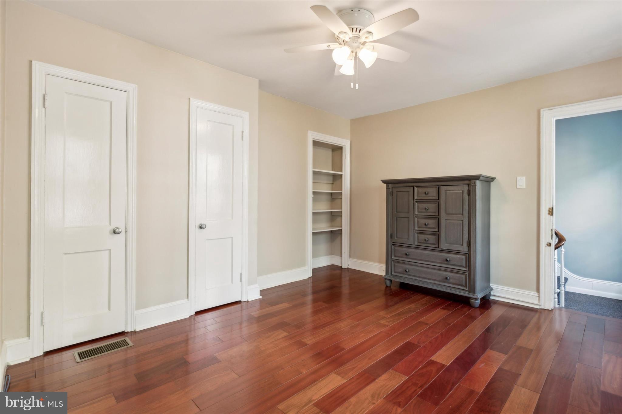 6113 Ridge Avenue Philadelphia, PA 19128 - Photo 10 of 25 an empty room with wooden floor closet and windows