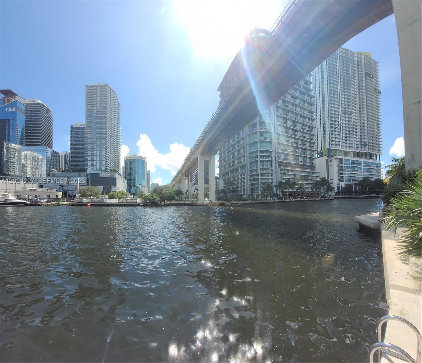 90 Southwest 3rd Street, Unit 2208 Miami, FL 33130 - Photo 46 of 56 a view of a lake with tall buildings