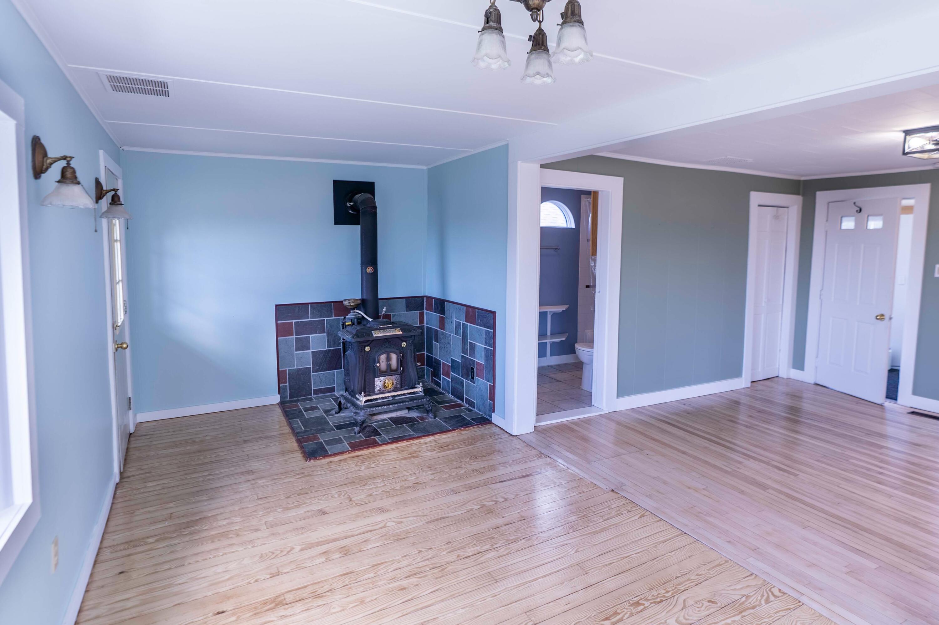 99 Little Machias Road Cutler, ME 04626 - Photo 18 of 48 dining room with wood stove