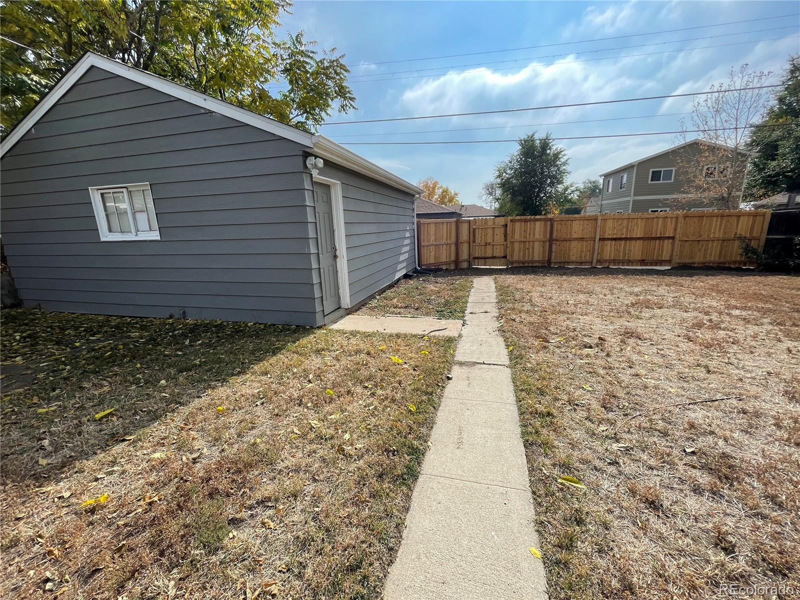 982 South Pecos Way Denver, CO 80223 - Photo 29 of 30 a view of a backyard