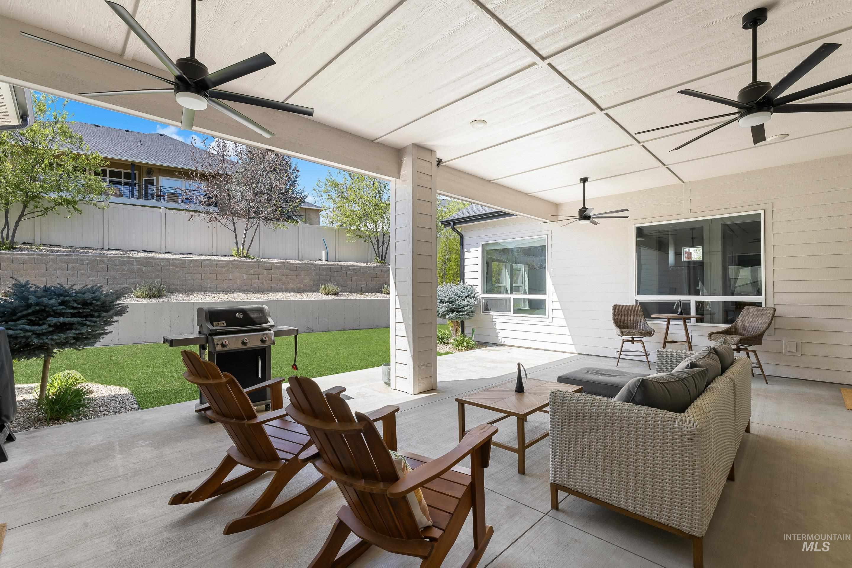 3483 South Grenze Way Meridian, ID 83642 - Photo 26 of 30 View of patio / terrace with ceiling fan, a grill, and outdoor seating