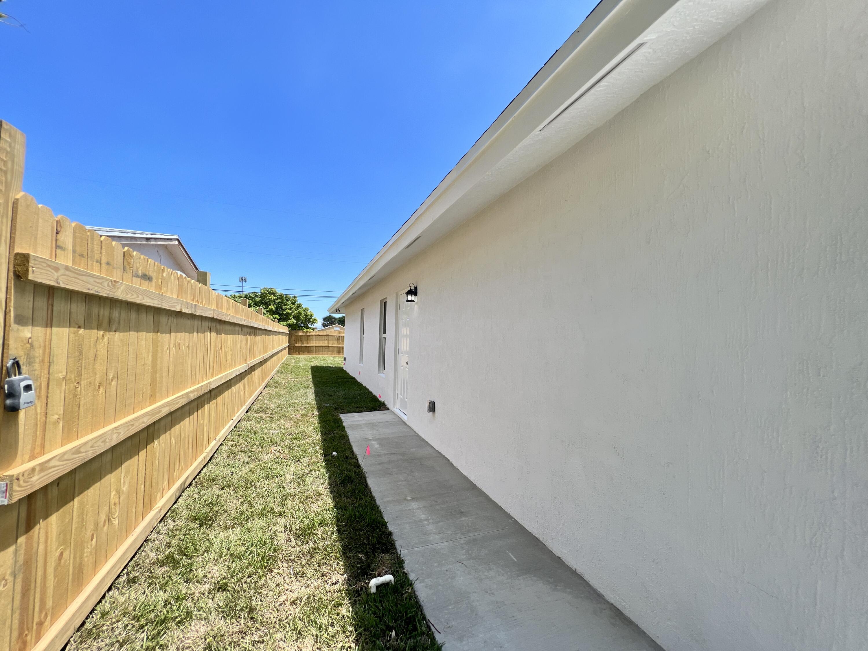 7838 Terrace Road Lake Worth, FL 33462 - Photo 53 of 61 DJI_20230423_134017_712