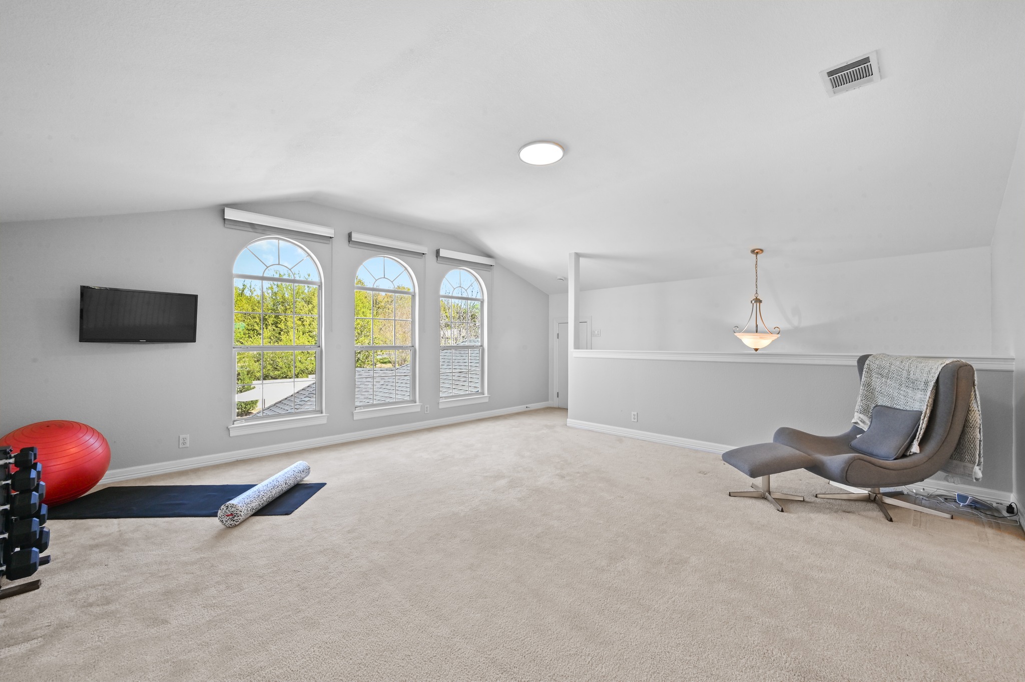 3125 Sun Drenched Path Austin, TX 78732 - Photo 25 of 38 This second-story space is tucked away from the main living area, giving you a dedicated zone for games, hobbies, or a private media room