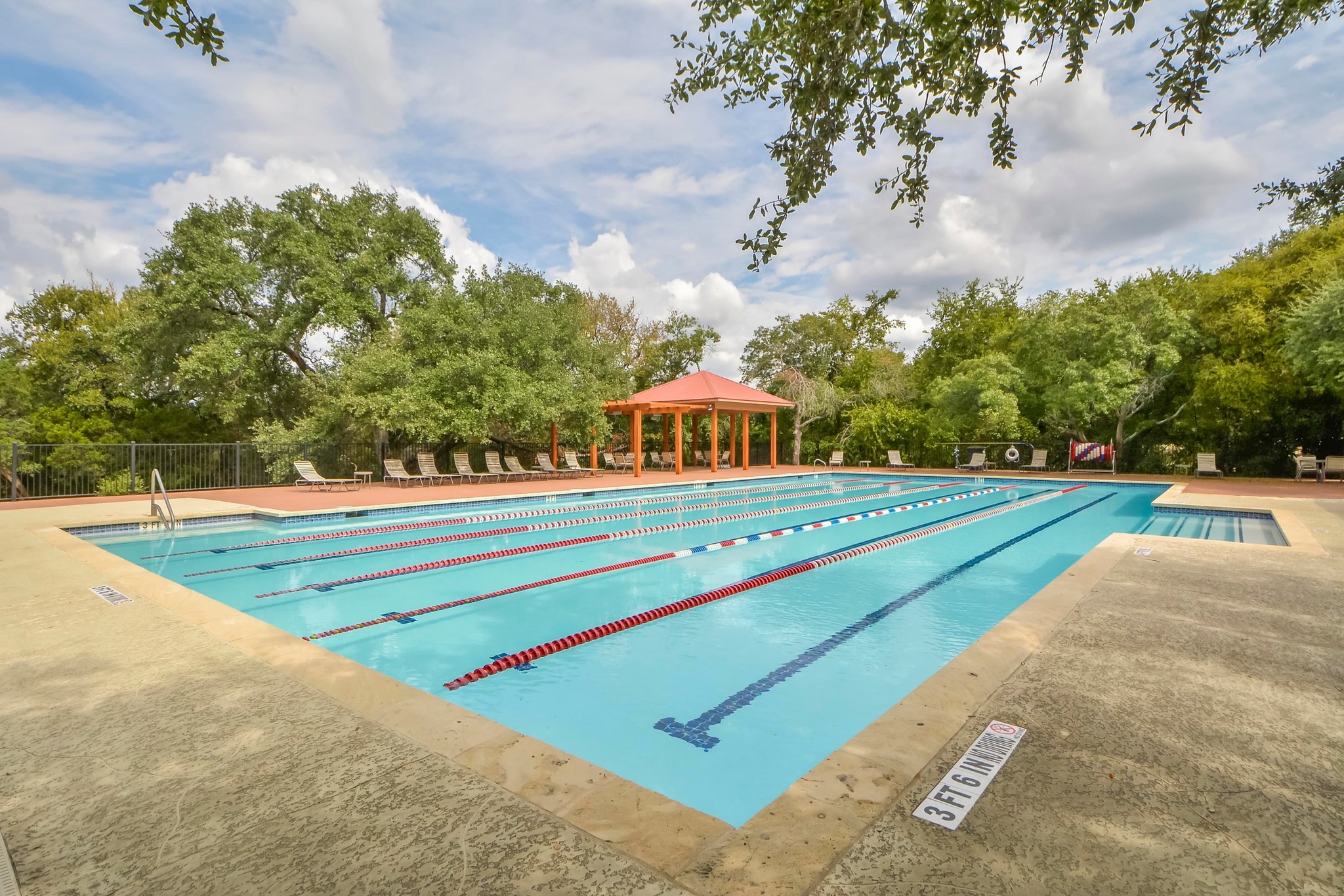 3125 Sun Drenched Path Austin, TX 78732 - Photo 34 of 38 The large Steiner Ranch community pool is a hub for summer activity, featuring plenty of lounge space for soaking up the sun