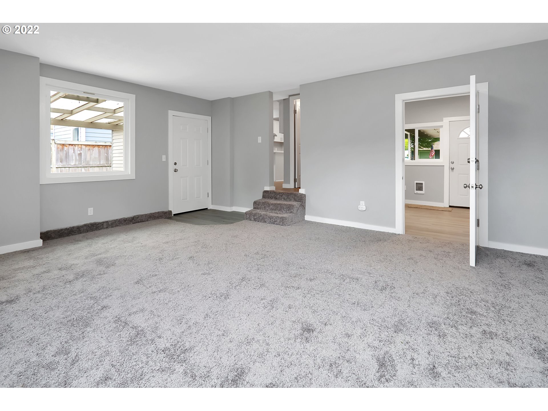 507 18th Avenue Longview, WA 98632 - Photo 18 of 29 an empty room with windows and cabinet