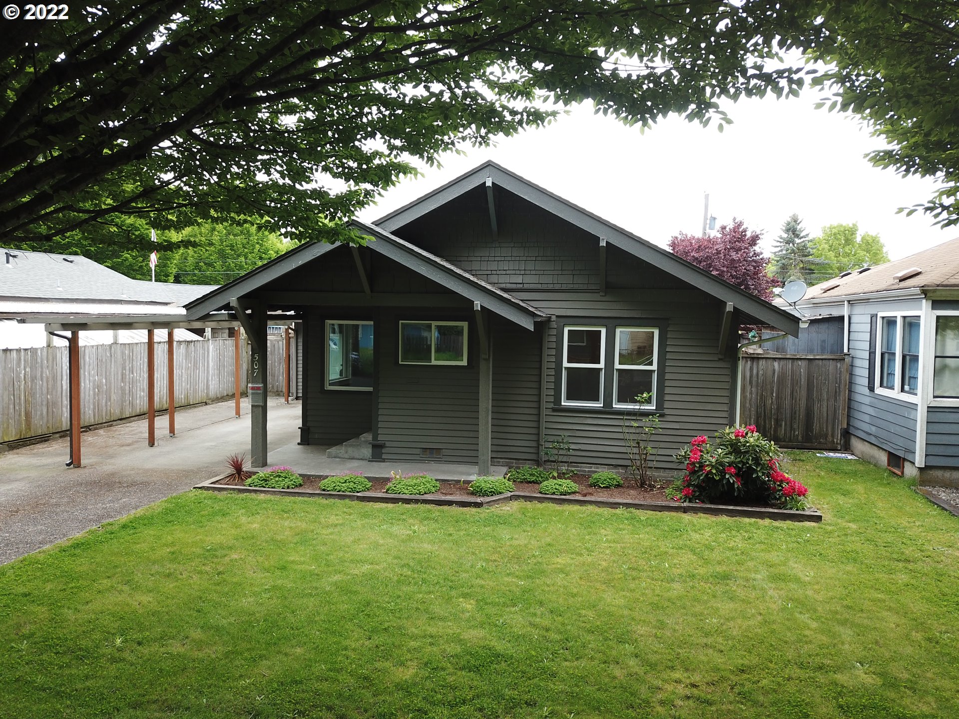 507 18th Avenue Longview, WA 98632 - Photo 29 of 29 a front view of house with yard barbeque and outdoor seating