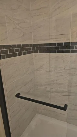 a bathroom with a sink a toilet and a bathtub