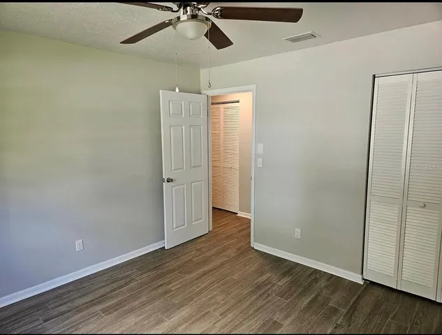 a bathroom with a sink a mirror and a shower
