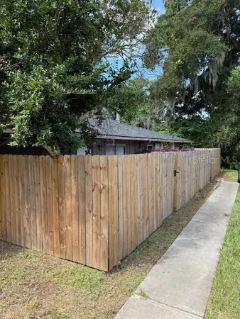 a bathroom with a sink vanity and toilet