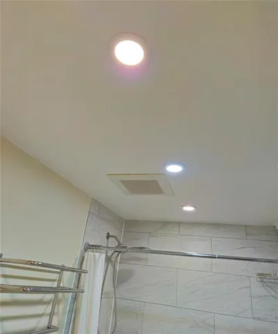 a view of a room with a fan