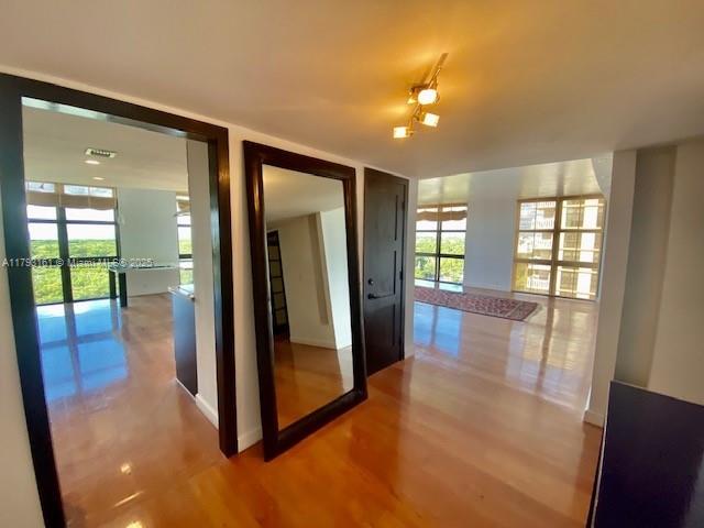 1121 Crandon Boulevard, Unit D802 Key Biscayne, FL 33149 - Photo 29 of 30 wooden floor in an empty room with a window