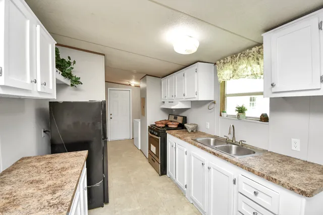 a view of hallway with washer and dryer
