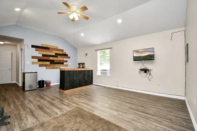 a kitchen with stainless steel appliances granite countertop a stove and a sink