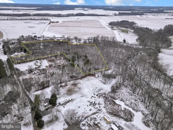 a view of a backyard of a house