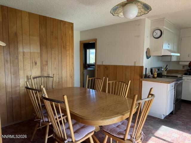 61 Rivers Road Smith, NV 89430 - Photo 30 of 57 a view of a dining room with furniture and a chandelier