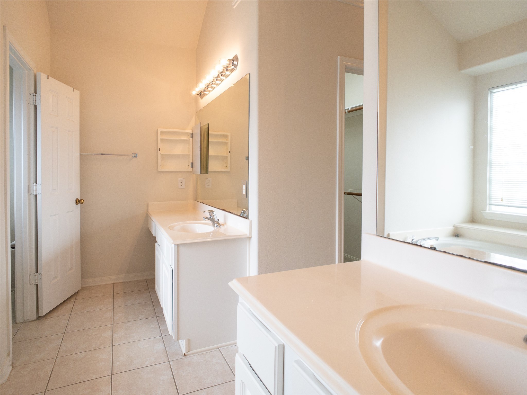 2727 South Cedar Hollow Drive Pearland, TX 77584 - Photo 23 of 41 knee-space at one vanity and another medicine cabinet