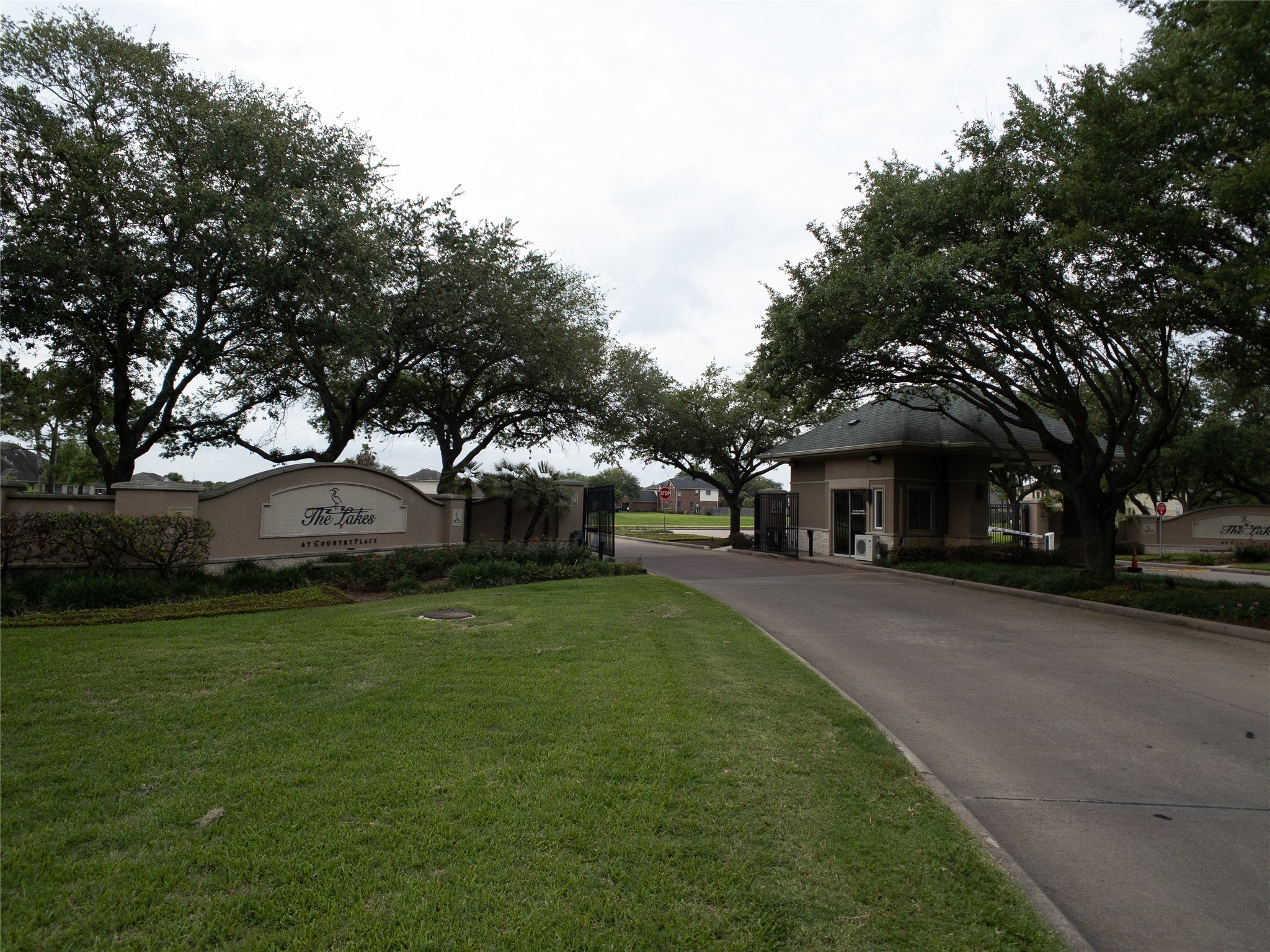 2727 South Cedar Hollow Drive Pearland, TX 77584 - Photo 40 of 41 guarded-gated neighborhood entrance
