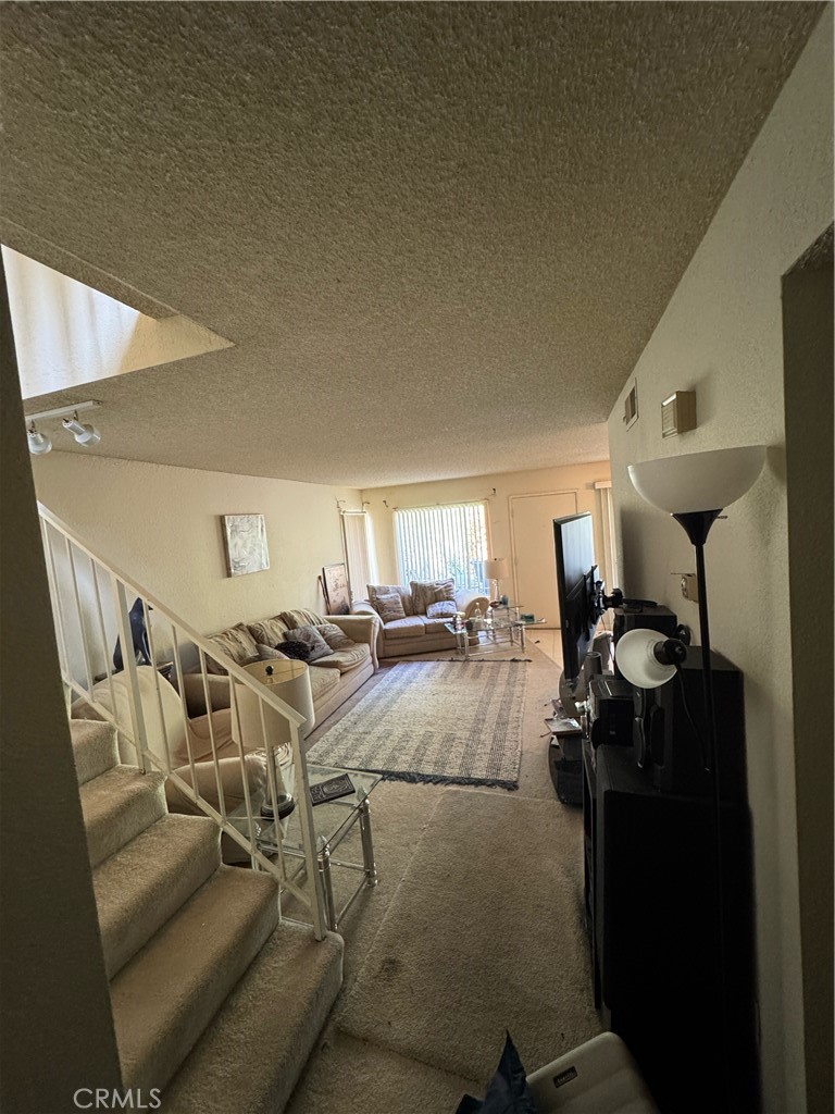 3700 Missouri Street West Covina, CA 91792 - Photo 13 of 14 a view of a livingroom with furniture and a window