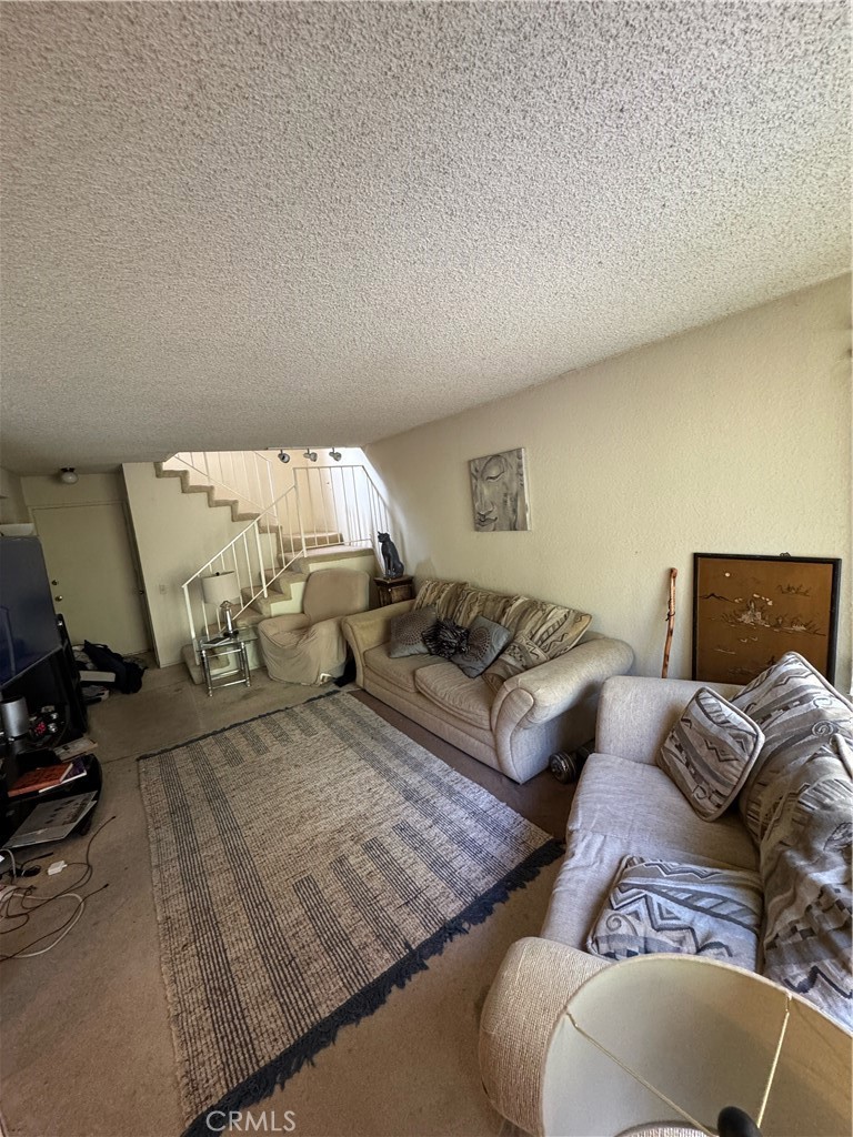3700 Missouri Street West Covina, CA 91792 - Photo 14 of 14 a living room with furniture and a couch