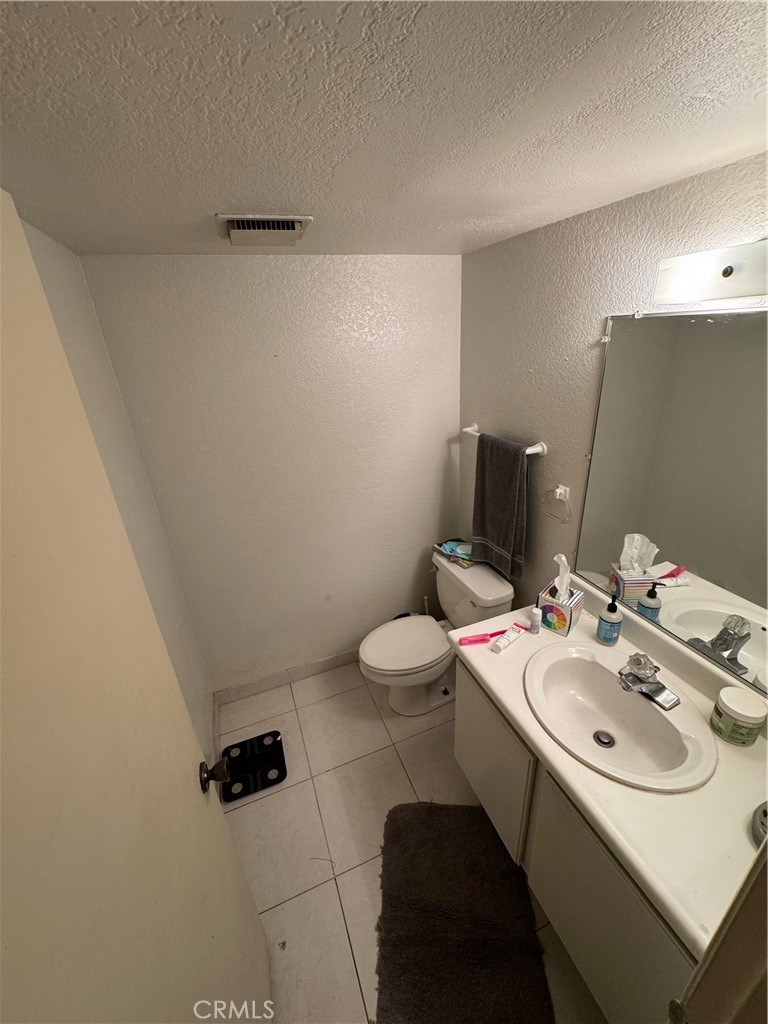 3700 Missouri Street West Covina, CA 91792 - Photo 6 of 14 a bathroom with a sink toilet and mirror
