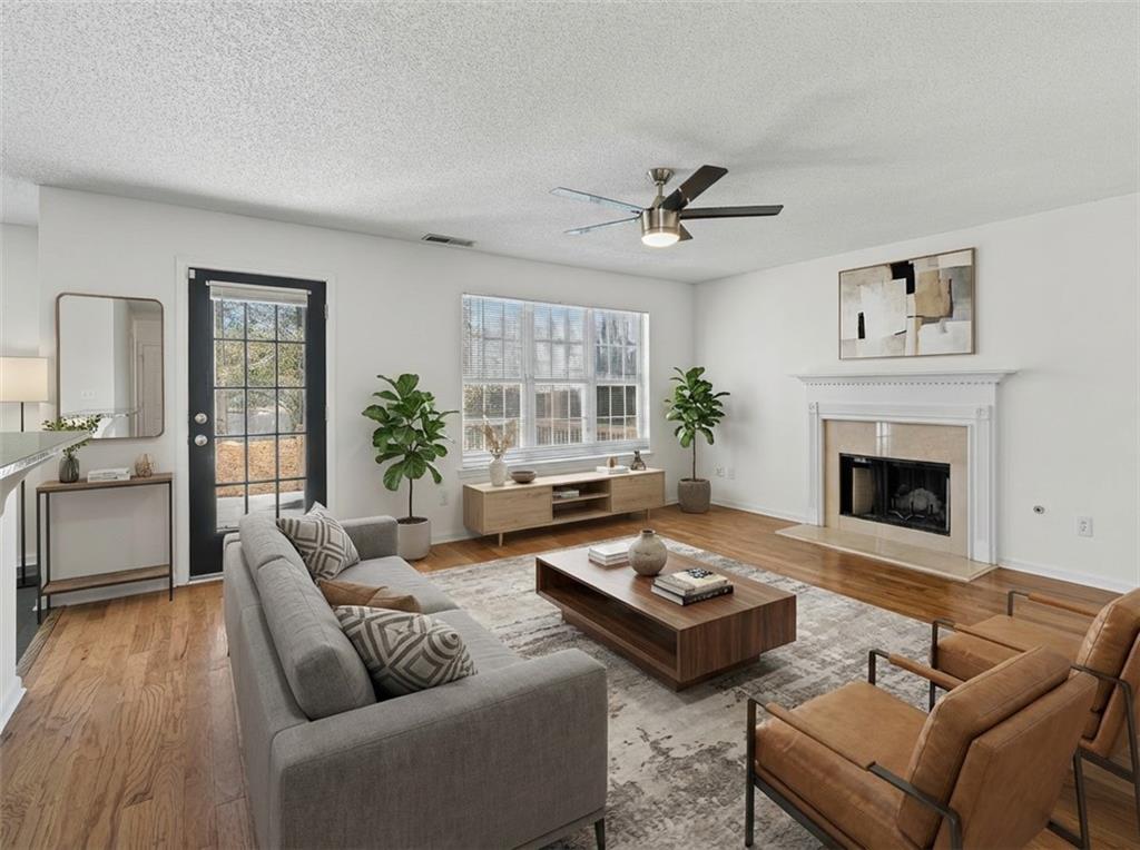 3550 Willow Tree Trace Decatur, GA 30034 - Photo 11 of 47 a living room with furniture and a fireplace