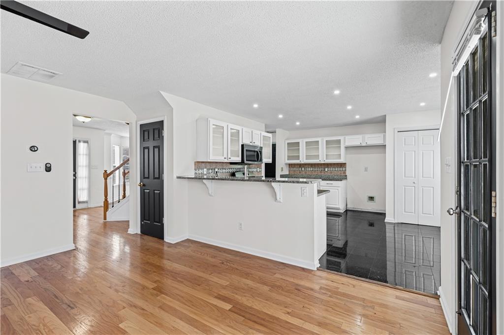 3550 Willow Tree Trace Decatur, GA 30034 - Photo 17 of 47 a view of kitchen view wooden floor and window