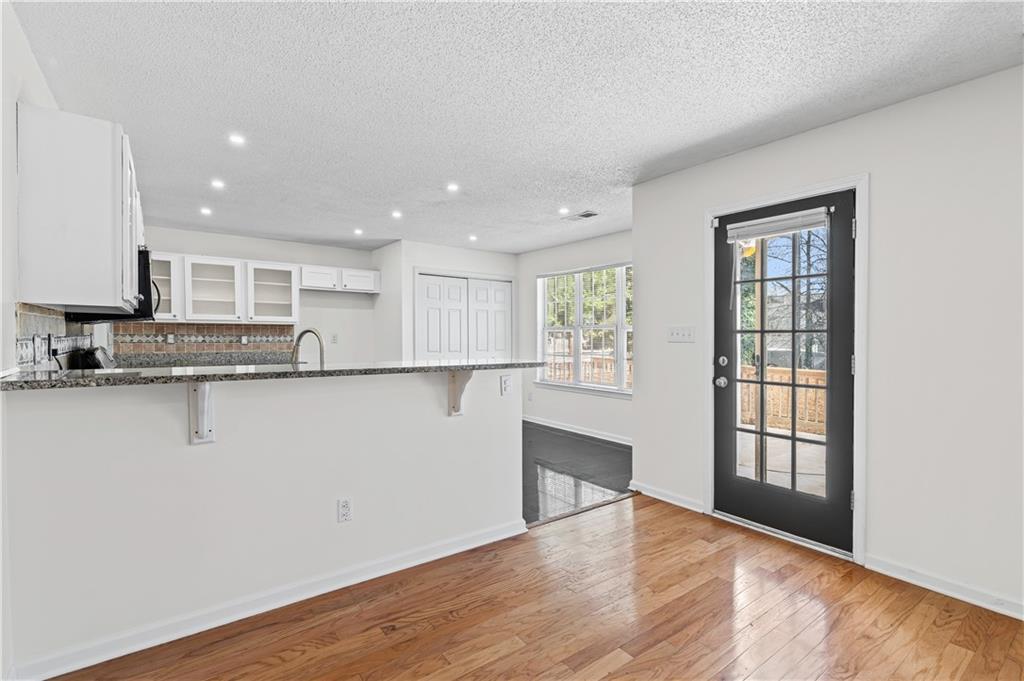 3550 Willow Tree Trace Decatur, GA 30034 - Photo 18 of 47 a view of a kitchen with wooden floor and a window