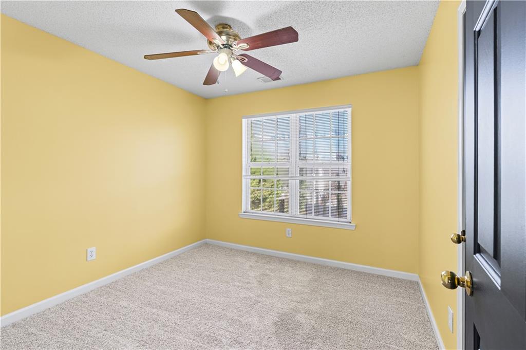 3550 Willow Tree Trace Decatur, GA 30034 - Photo 34 of 47 a view of an empty room with a window