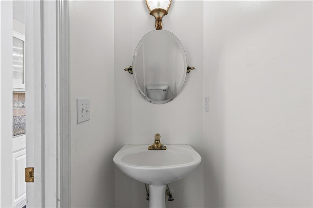 3550 Willow Tree Trace Decatur, GA 30034 - Photo 37 of 47 a bathroom with a sink and a mirror