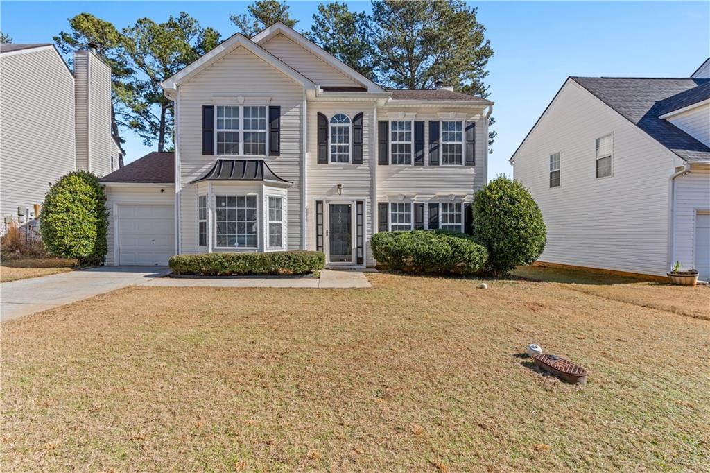 3550 Willow Tree Trace Decatur, GA 30034 - Photo 4 of 47 front view of a house with a yard