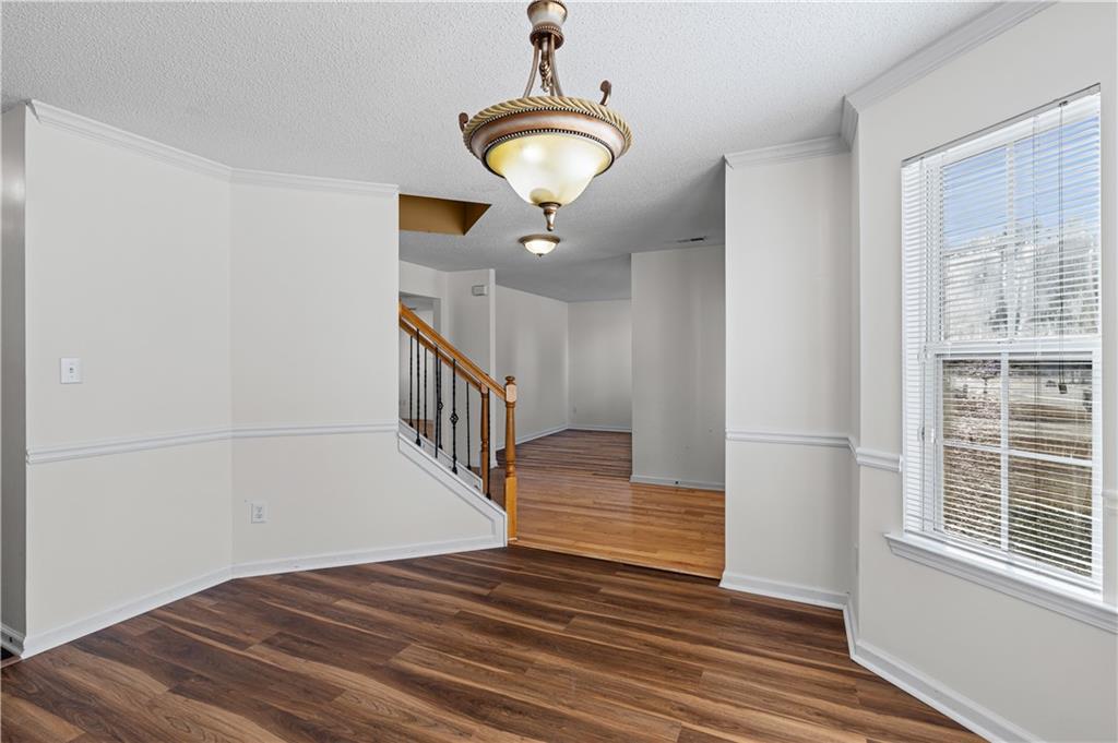 3550 Willow Tree Trace Decatur, GA 30034 - Photo 9 of 47 a view of entryway and hall with wooden floor