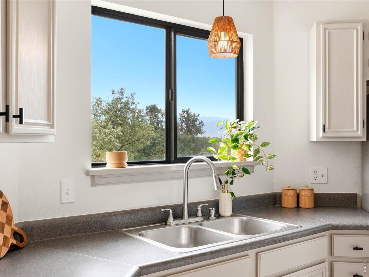 4945 Twin Lakes Road, Unit 46 Boulder, CO 80301 - Photo 20 of 42 Enjoy mountain views while preparing meals from the kitchen sink one of this home's many special touches.