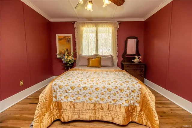 a bedroom with a bed and pillows