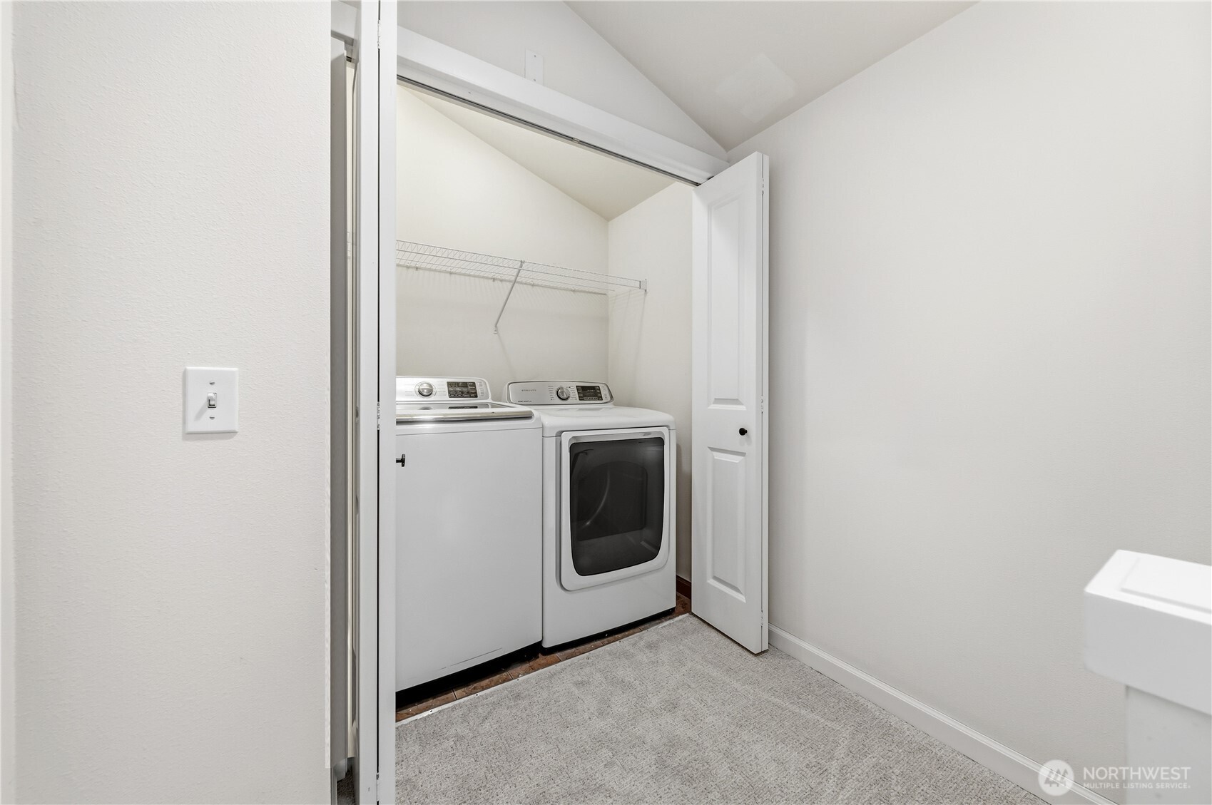 1122 North 92nd Street, Unit B Seattle, WA 98103 - Photo 19 of 28 a utility room with dryer and washer
