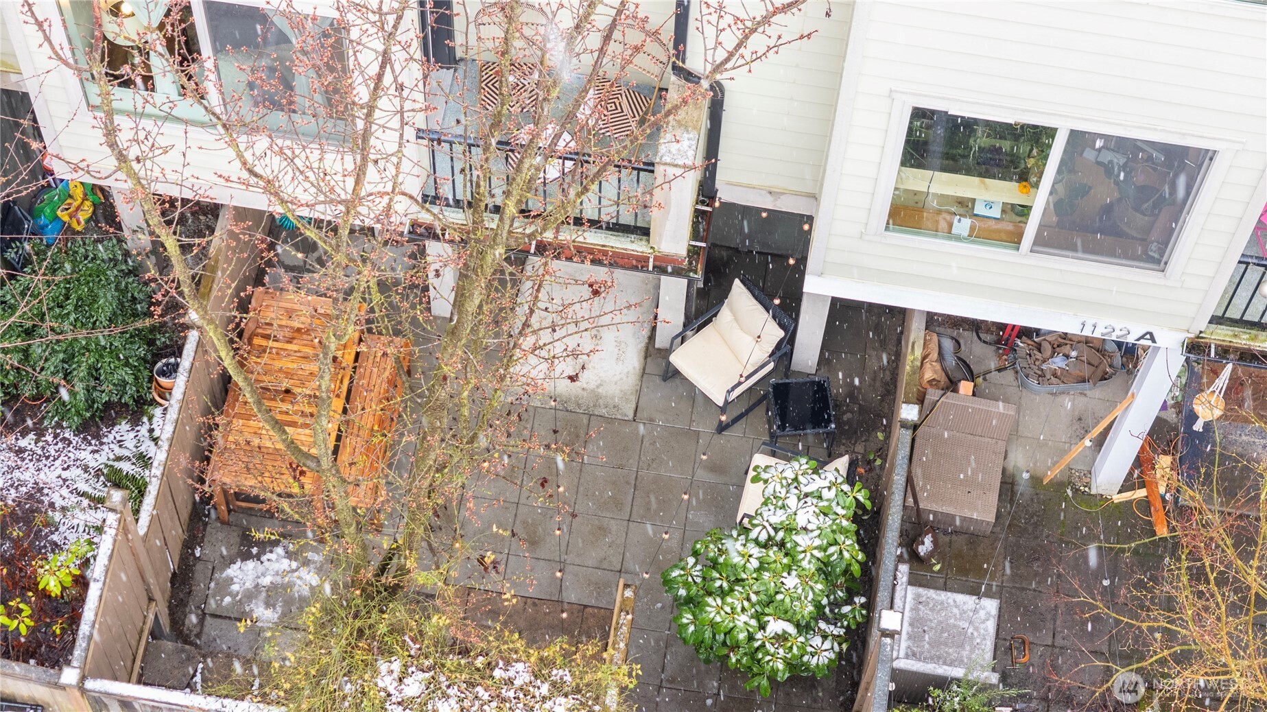 1122 North 92nd Street, Unit B Seattle, WA 98103 - Photo 22 of 28 a view of a pathway of a building