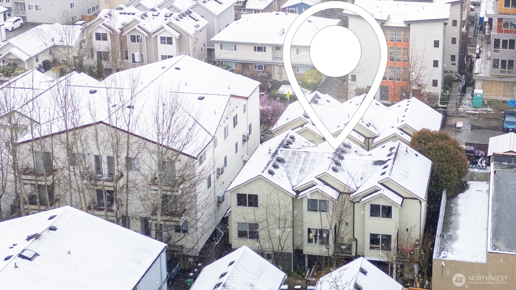 1122 North 92nd Street, Unit B Seattle, WA 98103 - Photo 24 of 28 a bathroom with a sink and mirror with painted walls