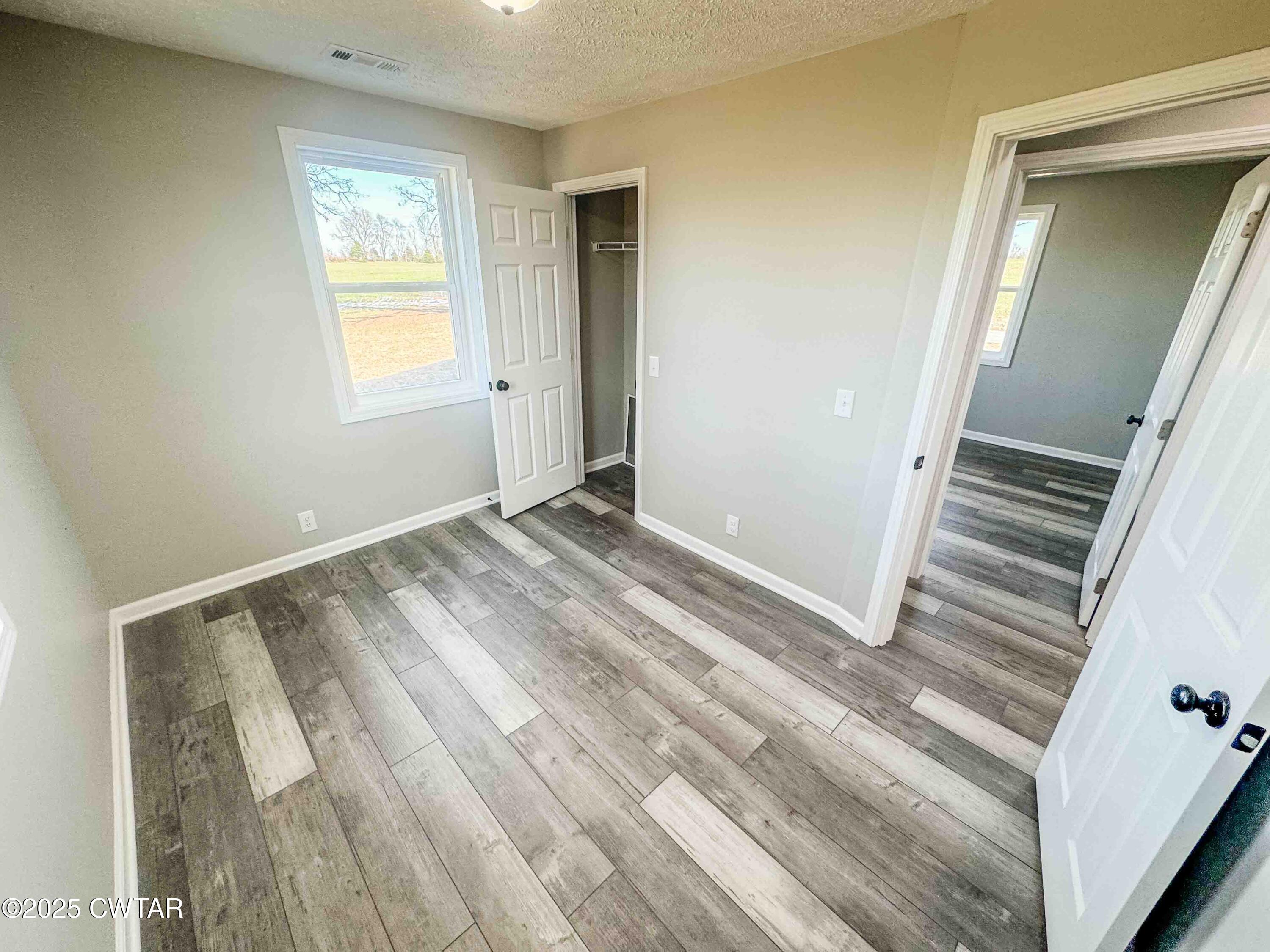 27 Watson Road Dyer, TN 38330 - Photo 8 of 17 a view of an empty room with a window