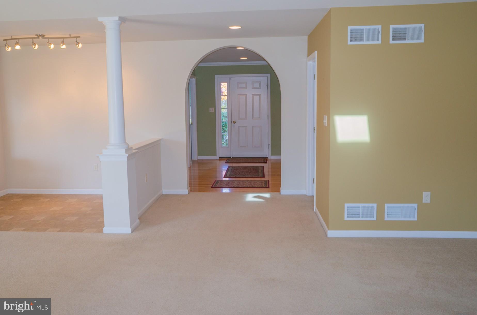 1221 Brighton Avenue Lititz, PA 17543 - Photo 22 of 57 a view of a hallway with wooden cabinet and mirror