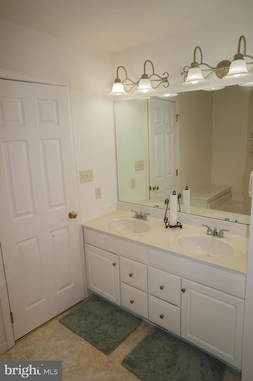 1221 Brighton Avenue Lititz, PA 17543 - Photo 28 of 57 a bathroom with a double vanity sink and mirror