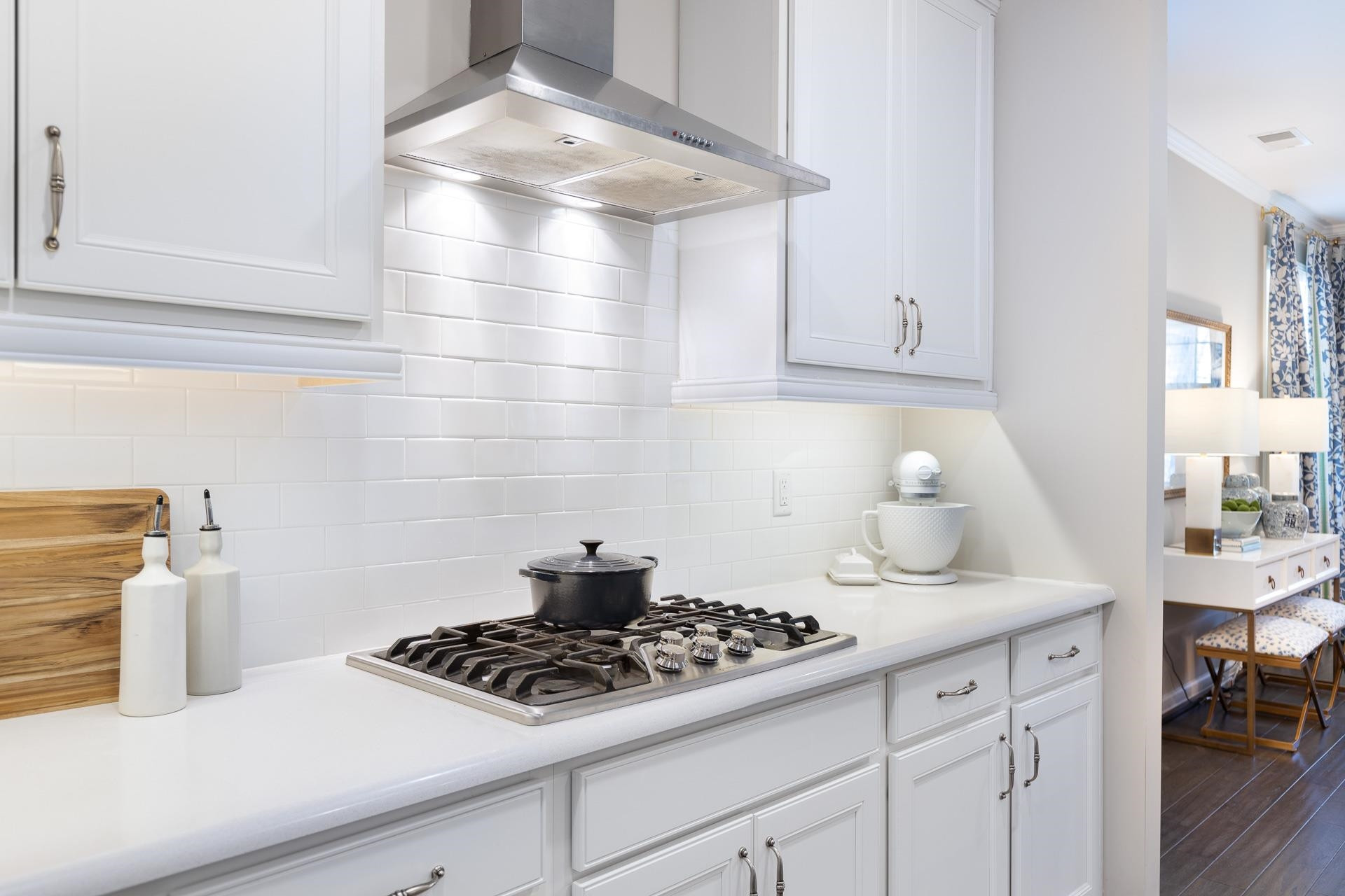 1010 Valley Rose Way Durham, NC 27712 - Photo 14 of 40 a kitchen with a stove and cabinets