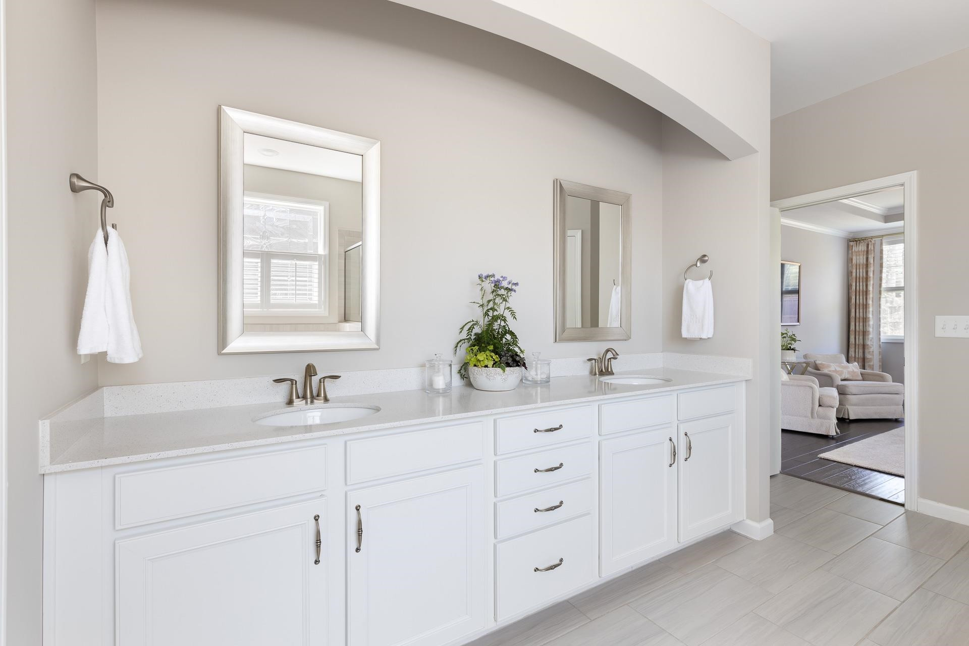 1010 Valley Rose Way Durham, NC 27712 - Photo 27 of 40 a bathroom with a double vanity sink and a