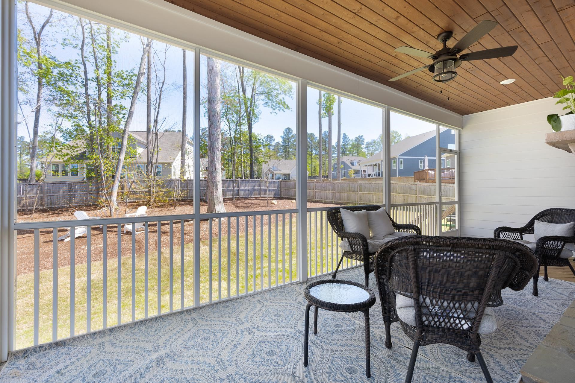 1010 Valley Rose Way Durham, NC 27712 - Photo 30 of 40 a living room with furniture and a floor to ceiling window