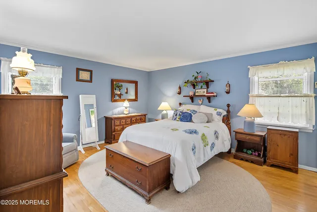 a bed room with a bed and a furniture