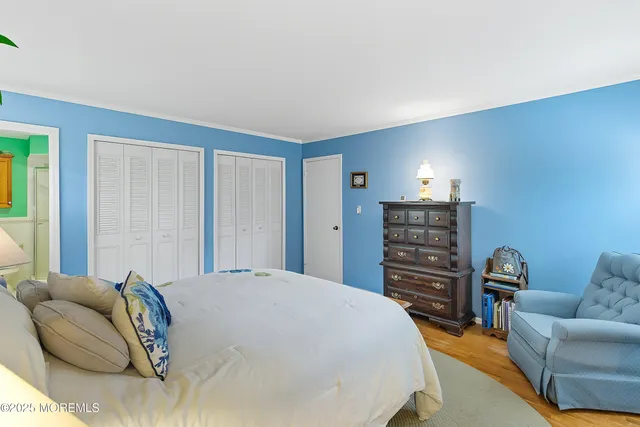 a bedroom with a bed and furniture